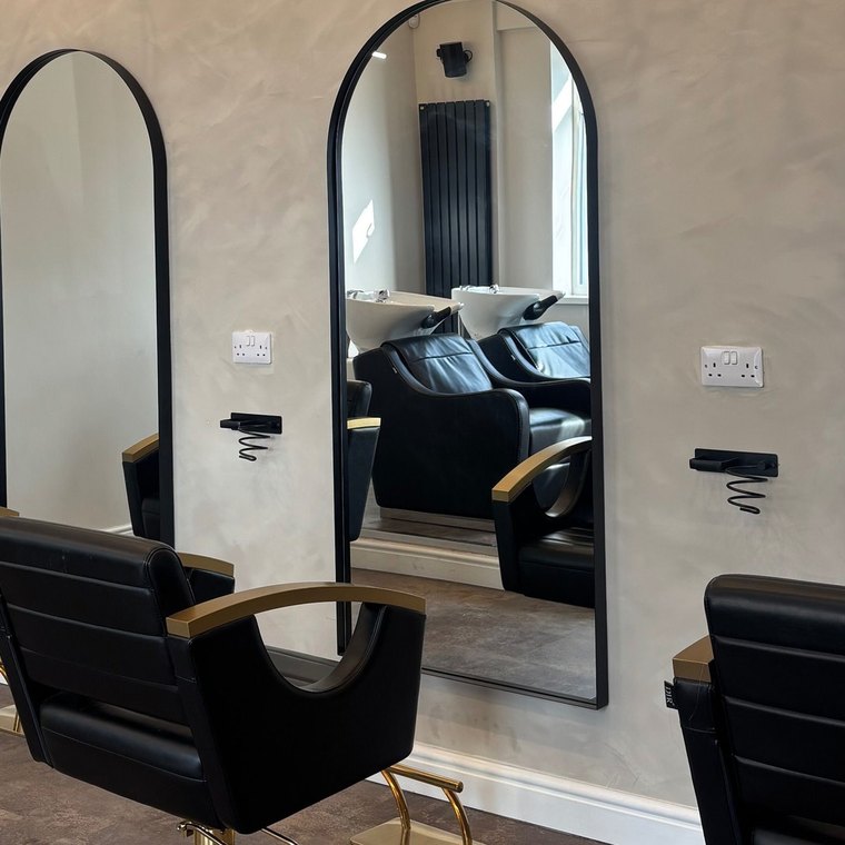 The styling stations and arched mirrors at Lucy Swaine Hairdressing